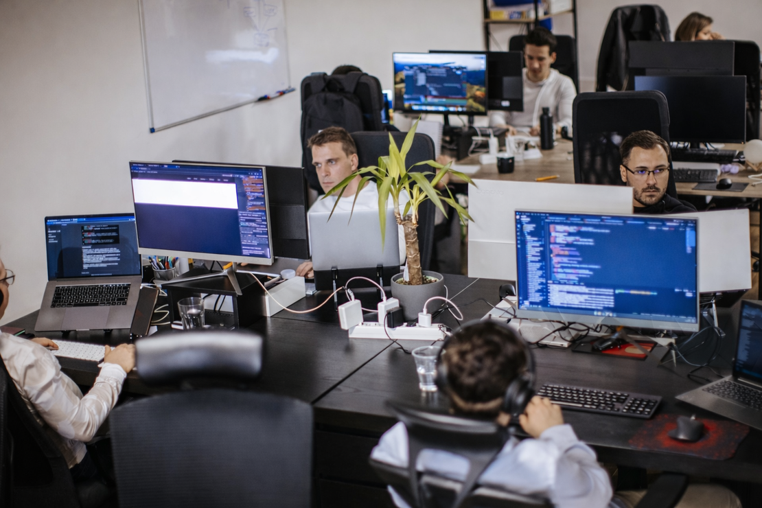 IT team planning a migration project in FlowQi